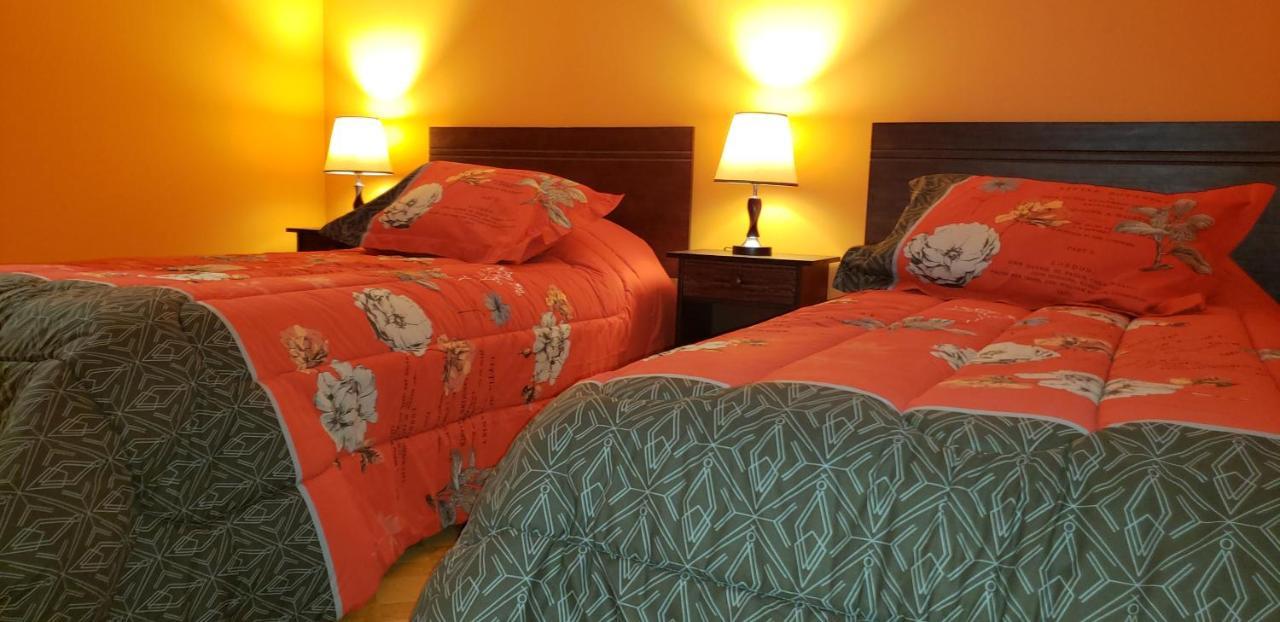 פורטו נטאלס Hostal Nataly מראה חיצוני תמונה