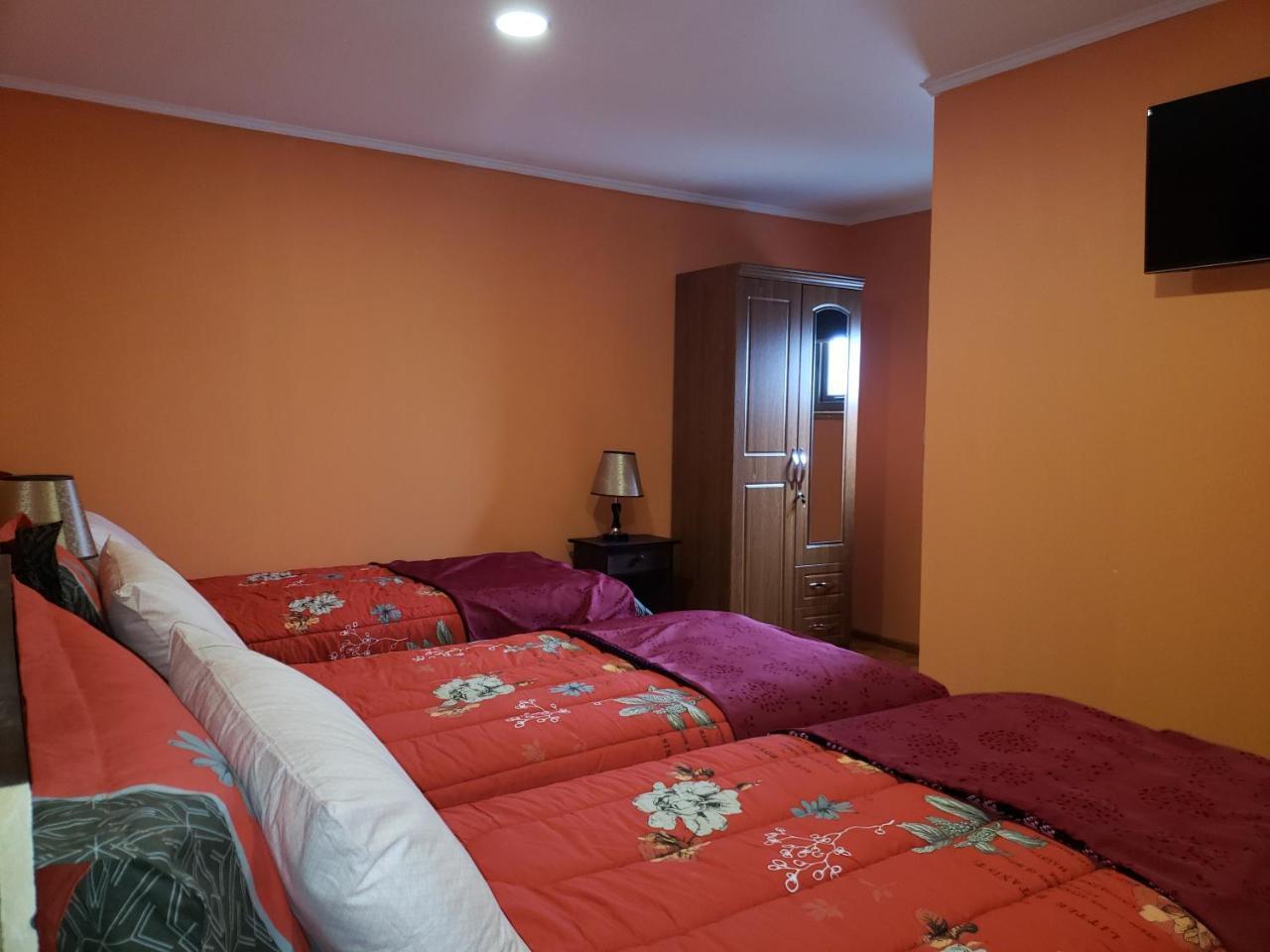 פורטו נטאלס Hostal Nataly מראה חיצוני תמונה